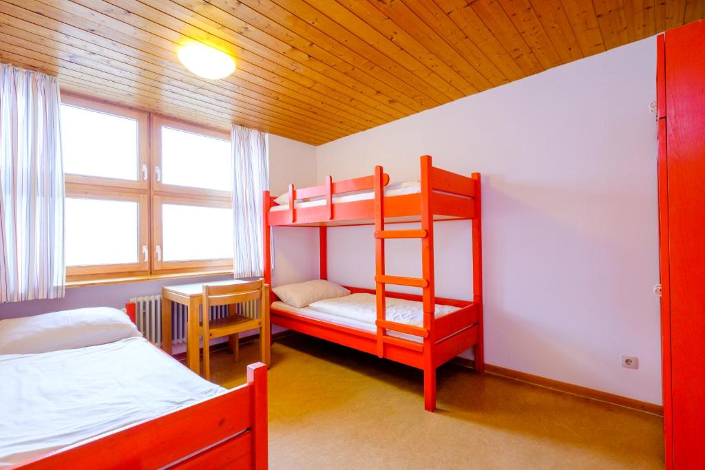 Postel nebo postele na pokoji v ubytování DJH Jugendherberge Pottenstein