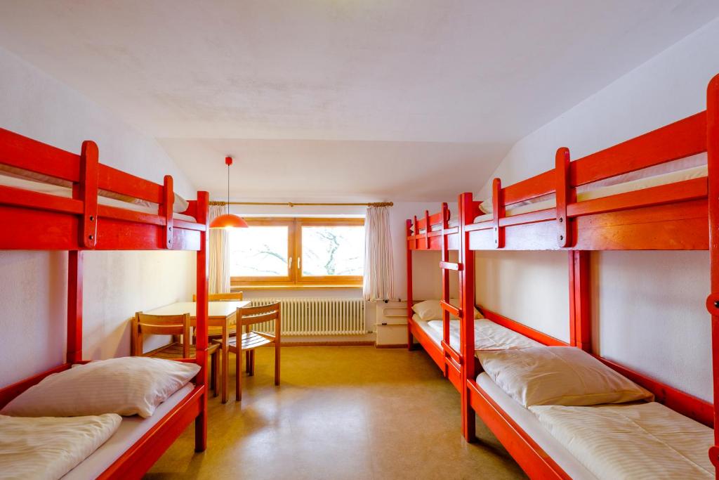 Postel nebo postele na pokoji v ubytování DJH Jugendherberge Pottenstein