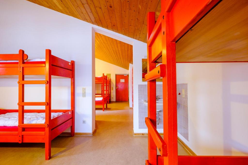 Postel nebo postele na pokoji v ubytování DJH Jugendherberge Pottenstein