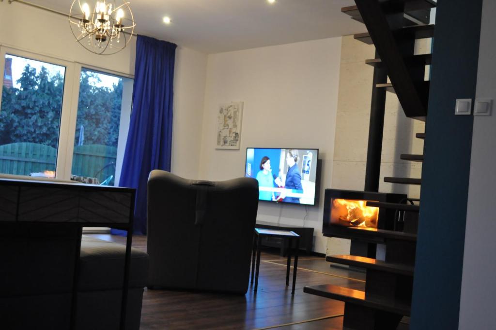 TV a/nebo společenská místnost v ubytování Villa Helena