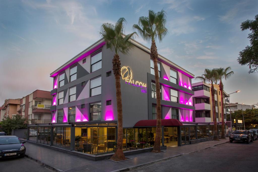 a hotel with pink lights on the side of it at Falcon 1511 in Antalya