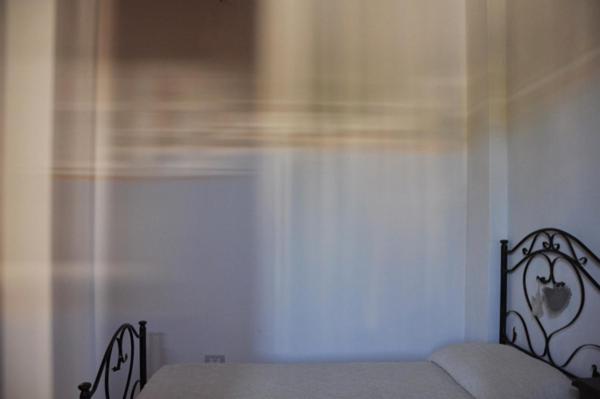 Postel nebo postele na pokoji v ubytování B&B CasaCorì