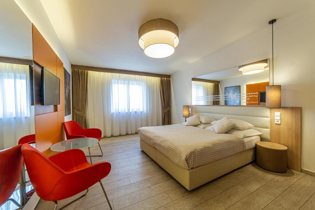 Postel nebo postele na pokoji v ubytování Salvator Boutique Hotel vegan-friendly