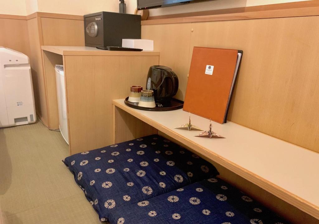 Kuchyň nebo kuchyňský kout v ubytování Kamon Hotel Namba