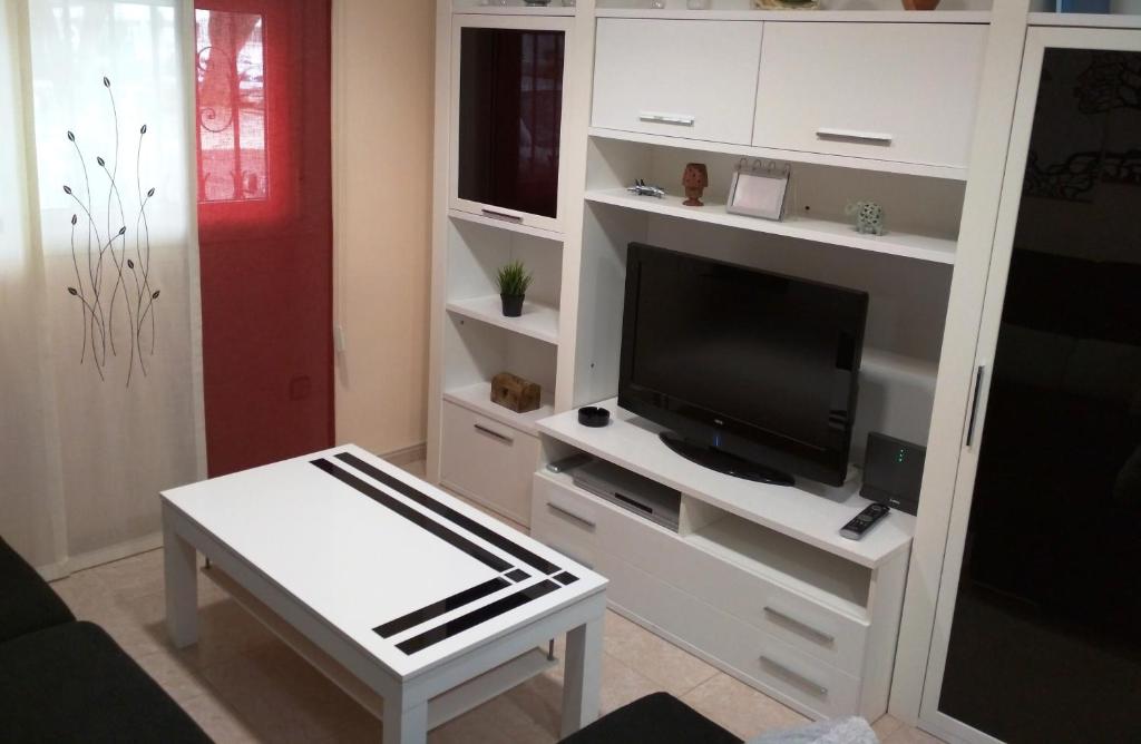TV a/nebo společenská místnost v ubytování Apart. con encanto en Torremolinos (Joaquin Blake)