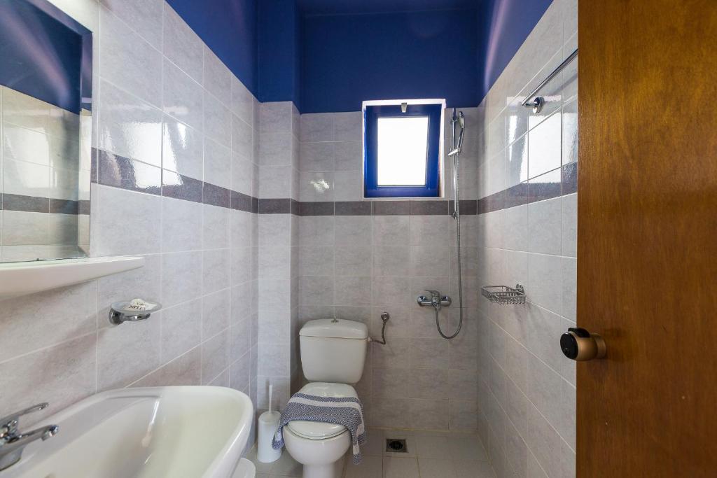 Kúpeľňa v ubytovaní Voukelari Rooms