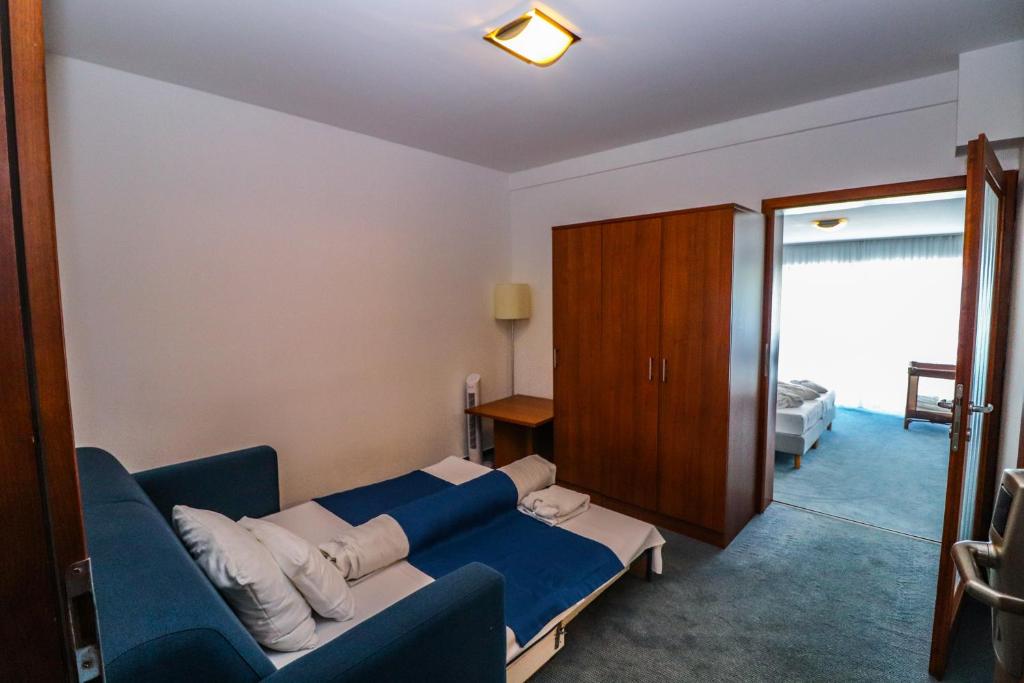 Posteľ alebo postele v izbe v ubytovaní Hotel Yacht Wellness & Business