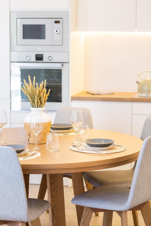 A kitchen or kitchenette at Vasilios Villa, with Pool, Gym & Close to Beach, By ThinkVilla