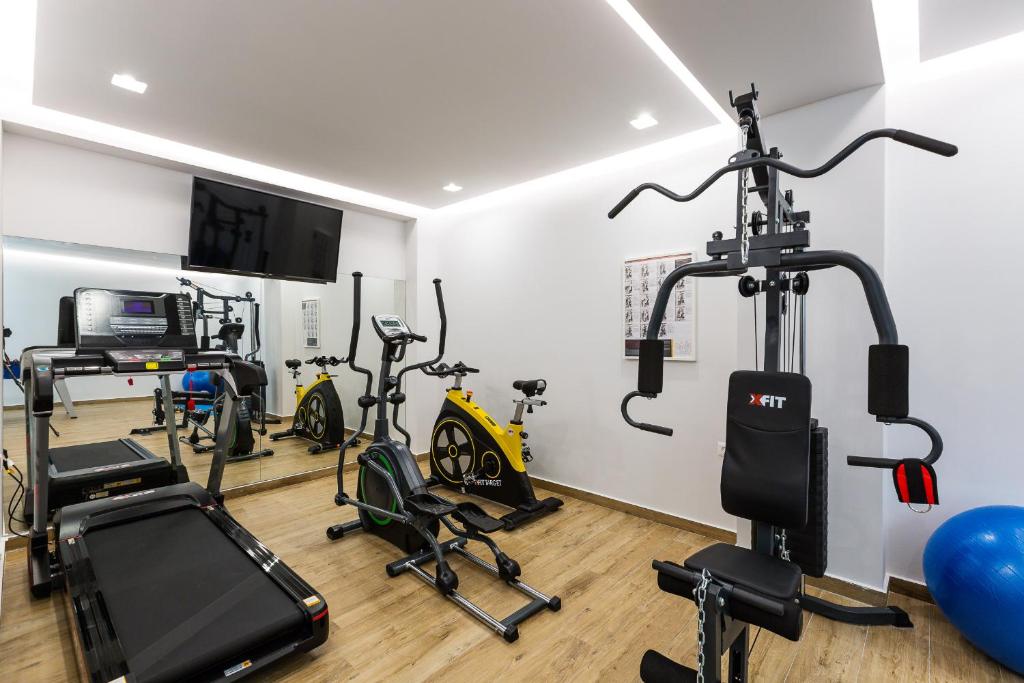 The fitness centre and/or fitness facilities at Vasilios Villa, with Pool, Gym & Close to Beach, By ThinkVilla