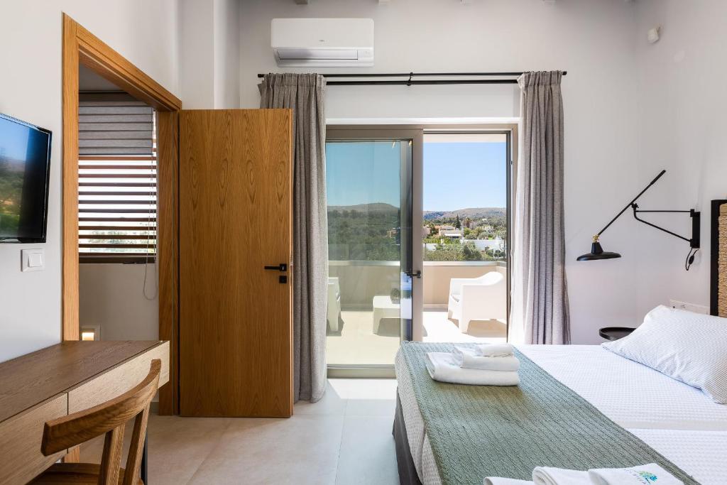 A bed or beds in a room at Vasilios Villa, with Pool, Gym & Close to Beach, By ThinkVilla