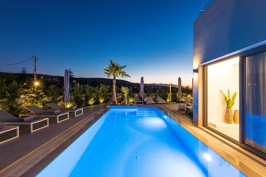 The swimming pool at or close to Vasilios Villa, with Pool, Gym & Close to Beach, By ThinkVilla