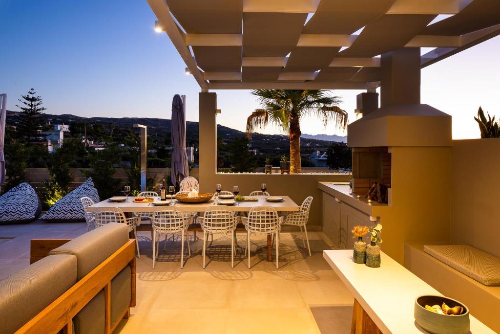 A seating area at Vasilios Villa, with Pool, Gym & Close to Beach, By ThinkVilla