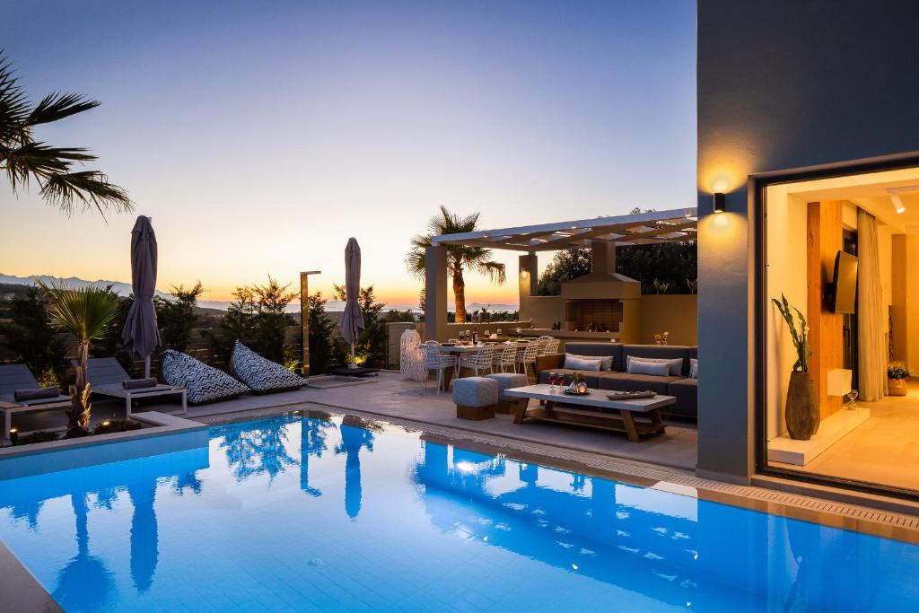 The swimming pool at or close to Vasilios Villa, with Pool, Gym & Close to Beach, By ThinkVilla