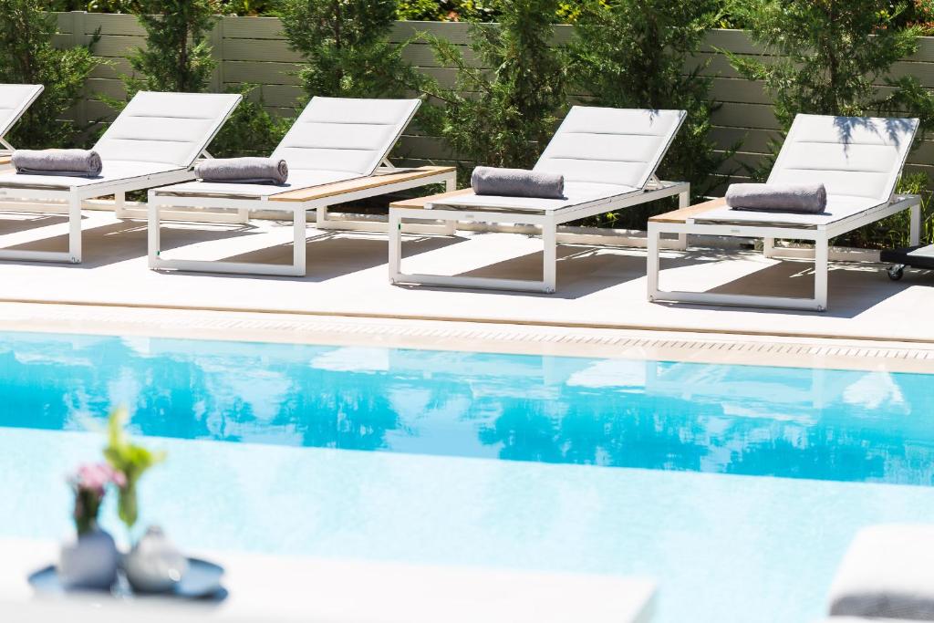 The swimming pool at or close to Vasilios Villa, with Pool, Gym & Close to Beach, By ThinkVilla