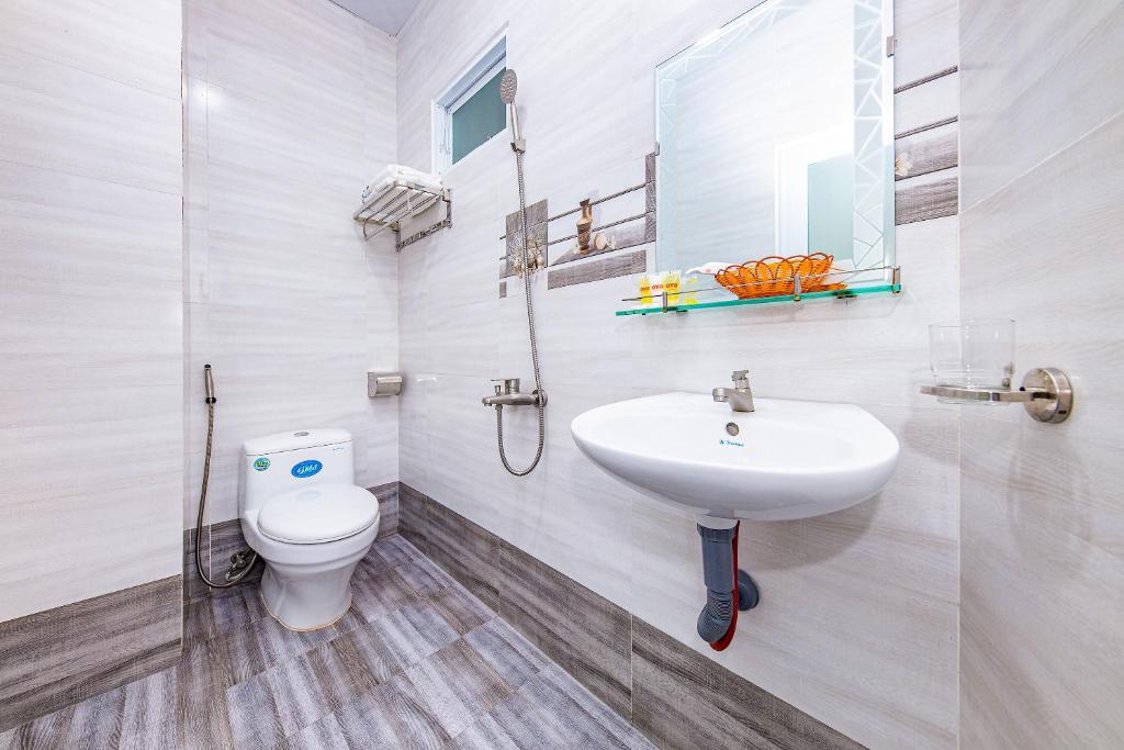 Koupelna v ubytování M&C Hotel Nha Trang