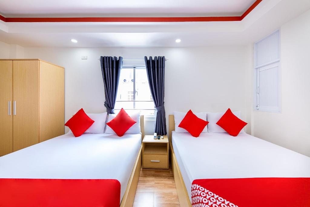 Postel nebo postele na pokoji v ubytování M&C Hotel Nha Trang