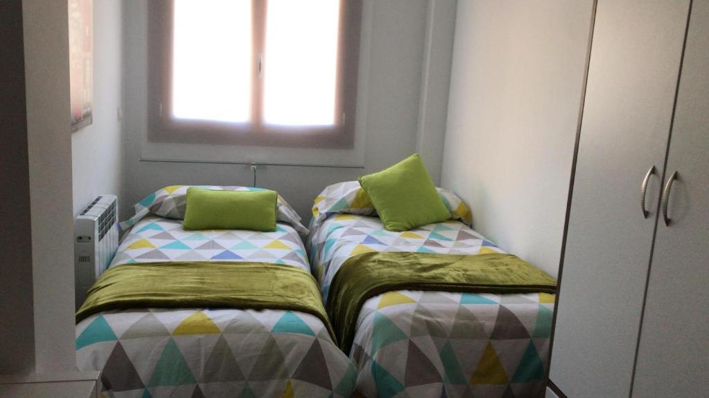 Postel nebo postele na pokoji v ubytování CAL PAU Guardiola de Berguedà