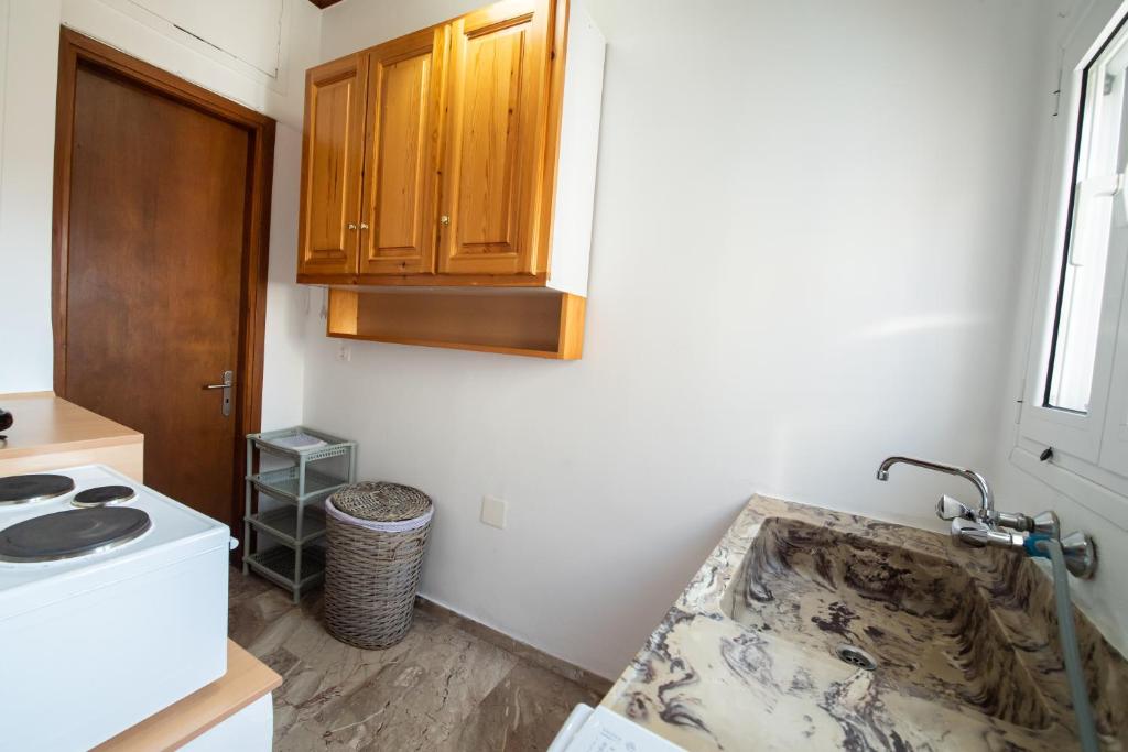 Kuchyňa alebo kuchynka v ubytovaní LEFKADA CENTRAL SQUARE APARTMENT