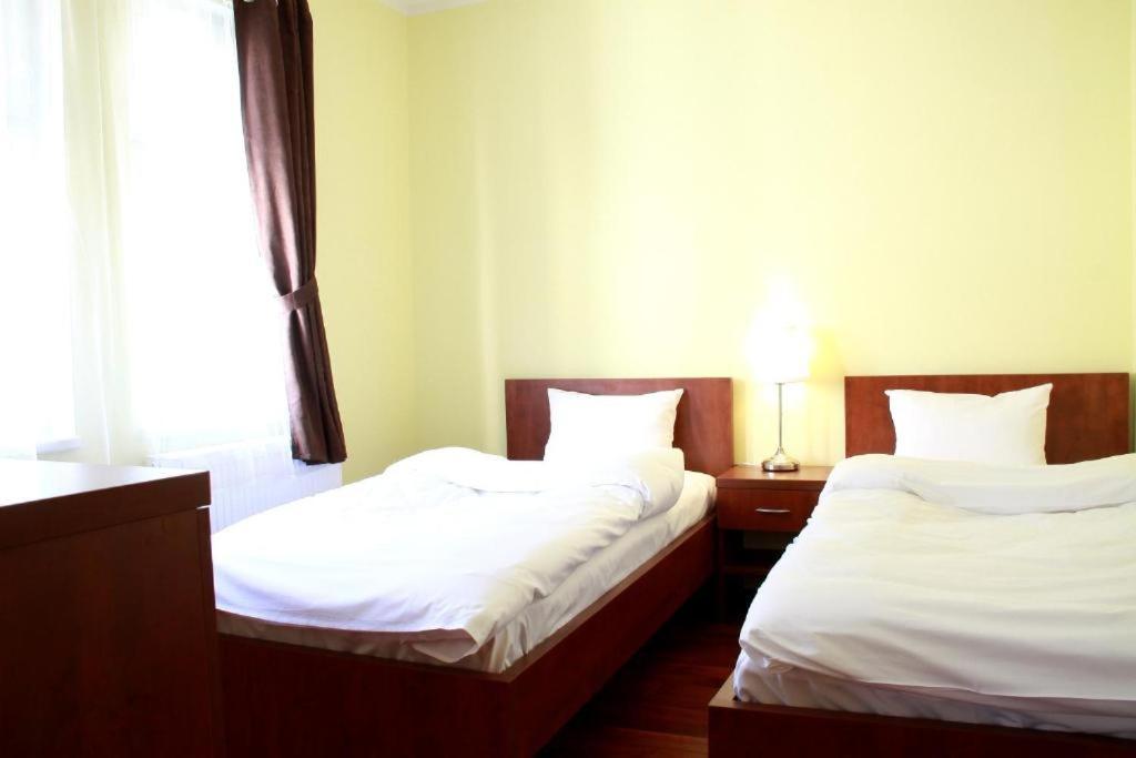 Postel nebo postele na pokoji v ubytování Hotel Vera