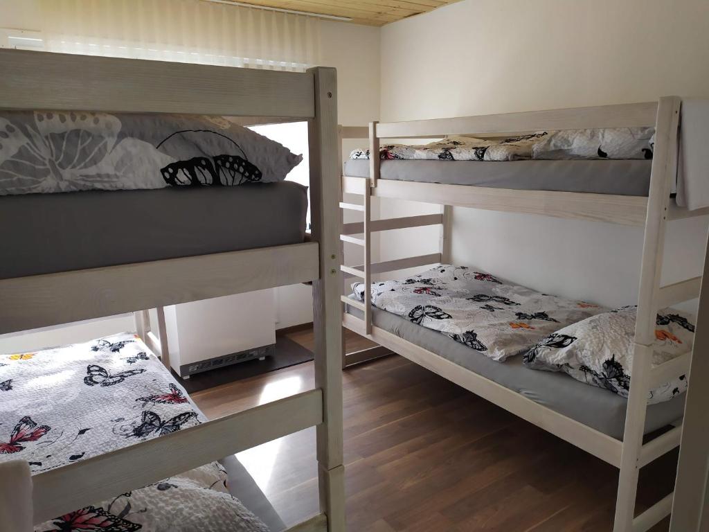 Postel nebo postele na pokoji v ubytování Statek Český Dvůr