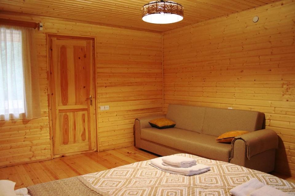 Postel nebo postele na pokoji v ubytování Hotel Ushba Hill