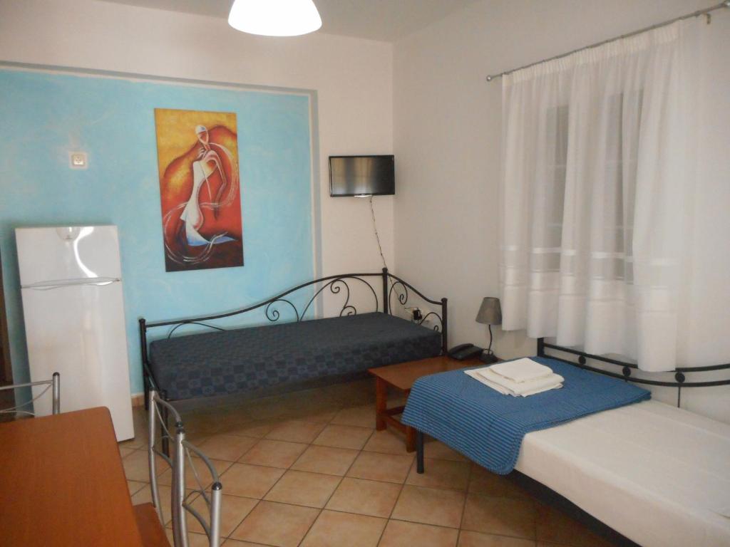 Postel nebo postele na pokoji v ubytování Pantonia Apartments