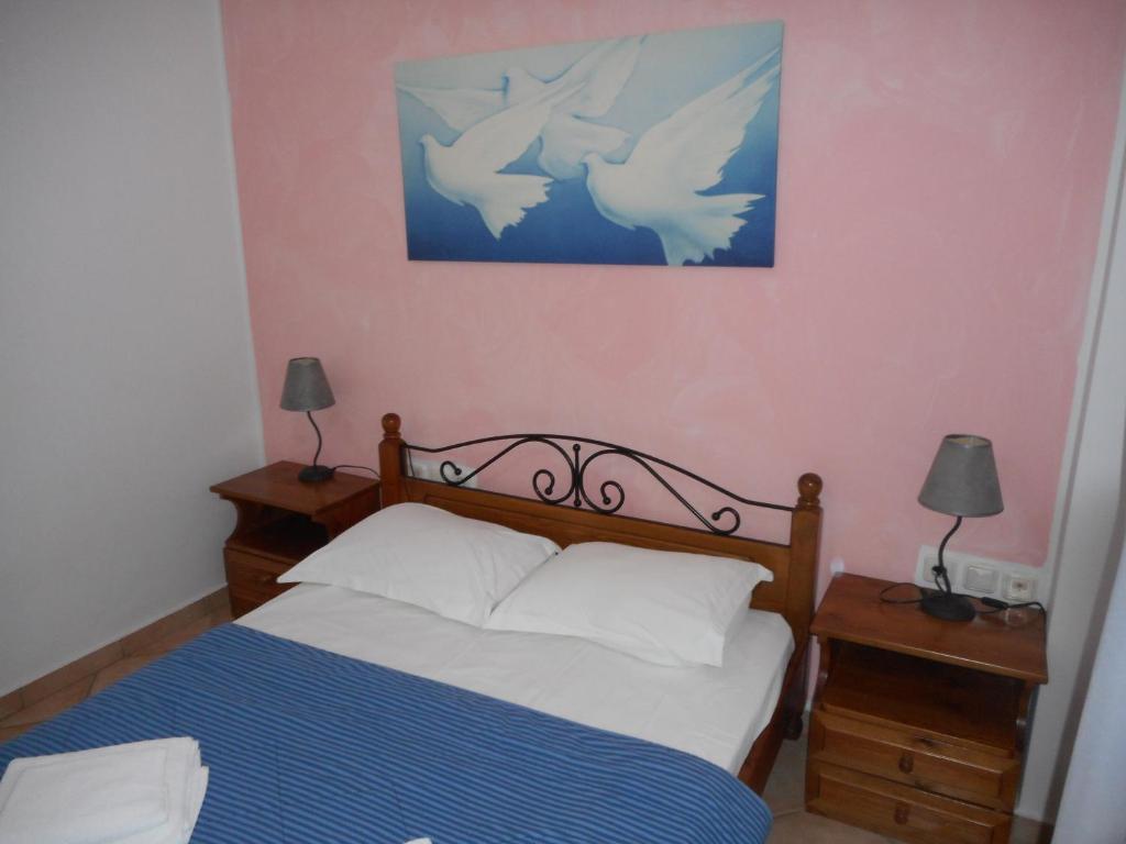 Postel nebo postele na pokoji v ubytování Pantonia Apartments