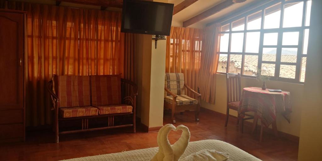 Χώρος καθιστικού στο Kuska Hostal