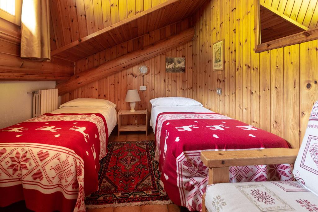 Postel nebo postele na pokoji v ubytování Baita De Mario