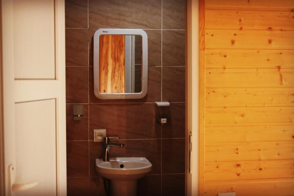 Koupelna v ubytování Hotel Ushba Hill