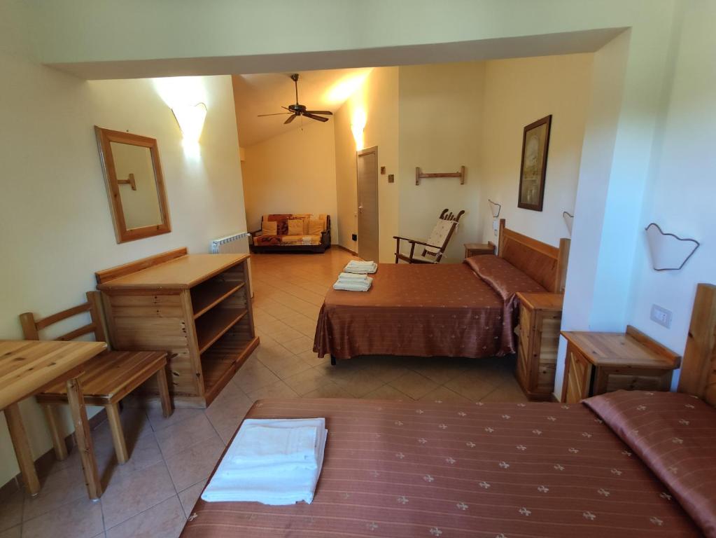 Postel nebo postele na pokoji v ubytování Agriturismo Zugarelli