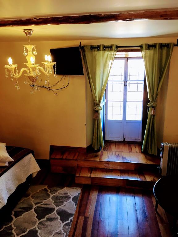 Postel nebo postele na pokoji v ubytování Kori Gems Inn