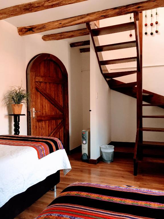 Postel nebo postele na pokoji v ubytování Kori Gems Inn