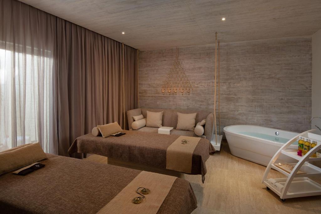 Postel nebo postele na pokoji v ubytování Meliá Punta Cana Beach Wellness Inclusive - Adults only