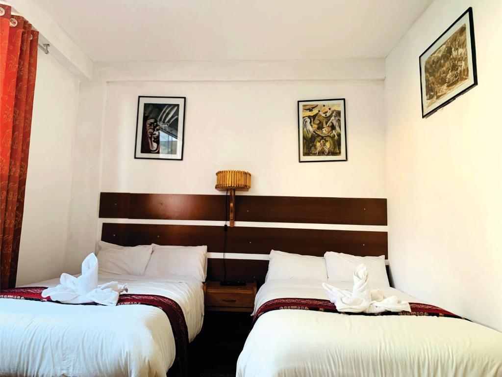 Postel nebo postele na pokoji v ubytování Inka Khawarina Tambo Lodge