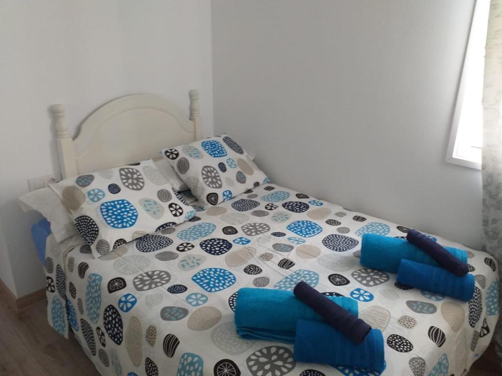 Postel nebo postele na pokoji v ubytování VISTAMAR VISTALUNA