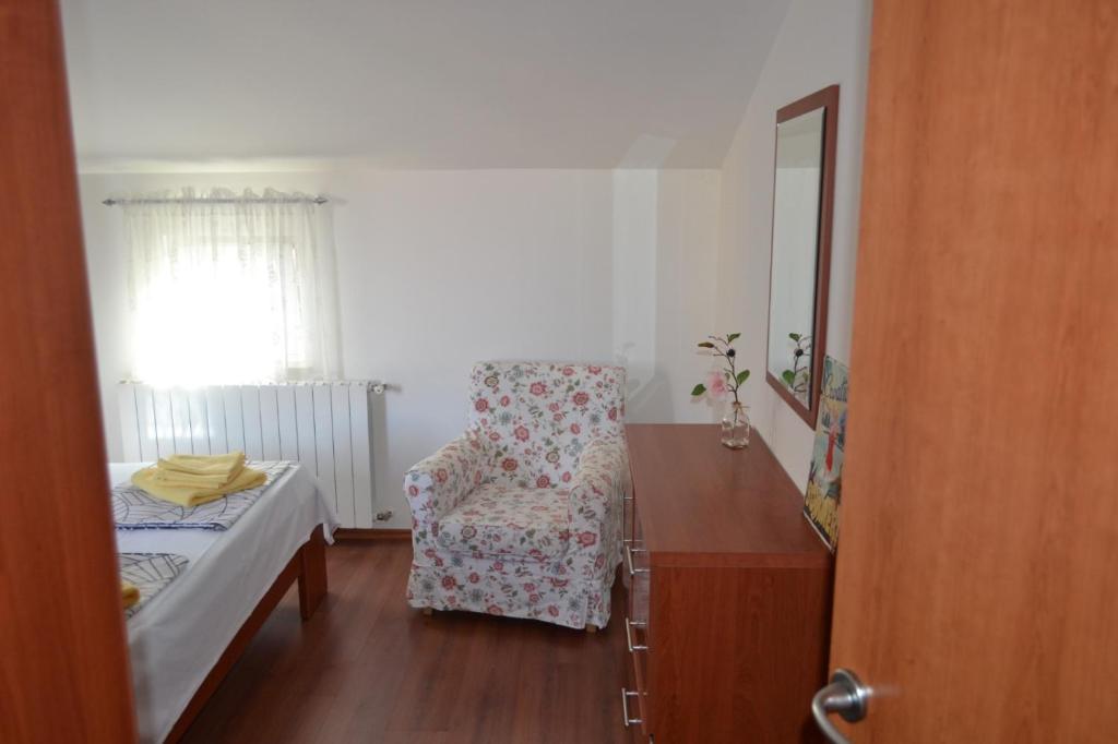 Łóżko lub łóżka w pokoju w obiekcie Apartment Din