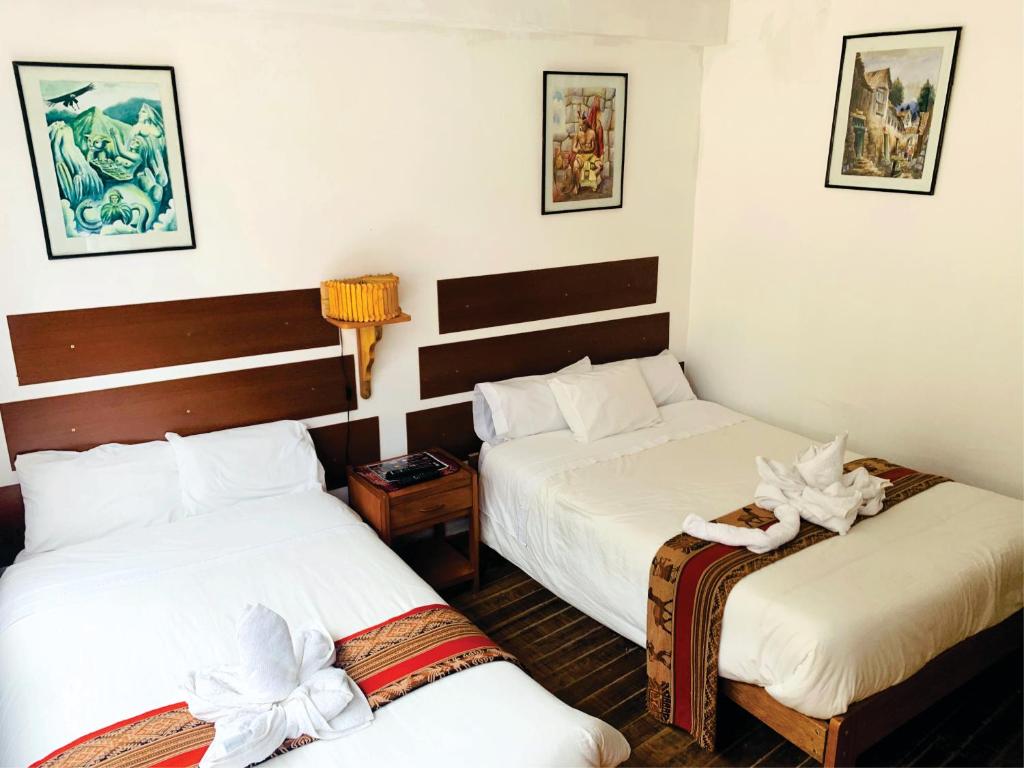 Postel nebo postele na pokoji v ubytování Inka Khawarina Tambo Lodge