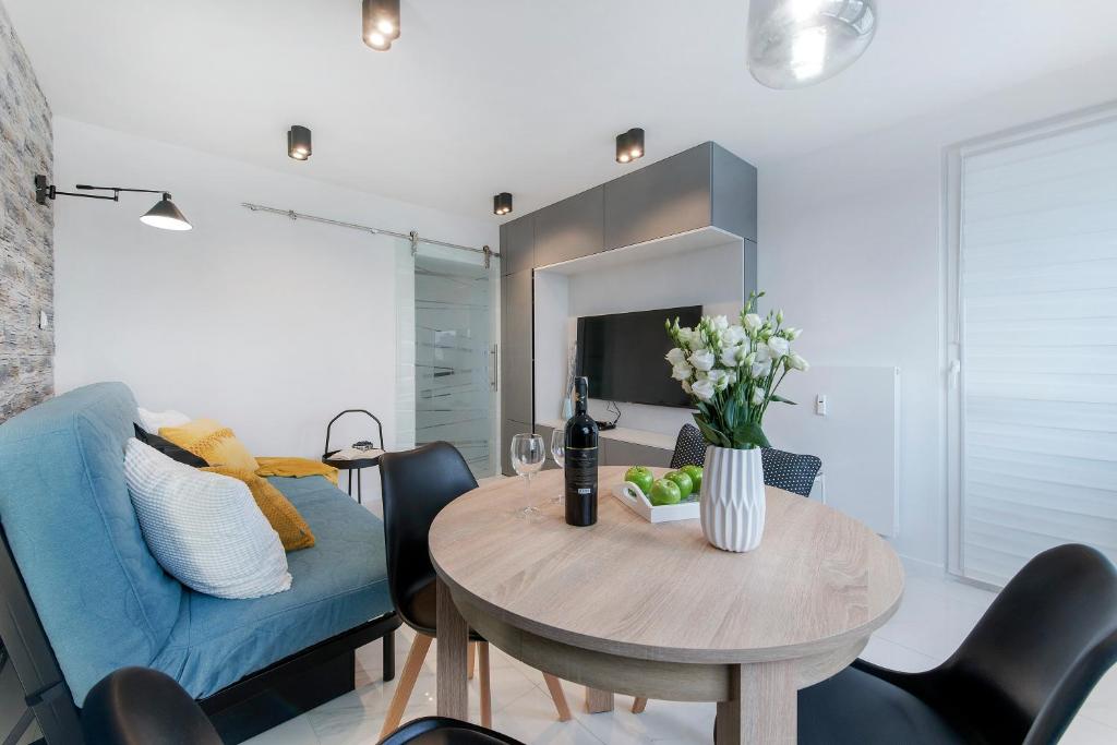 Posedenie v ubytovaní P&O Apartments Zgoda