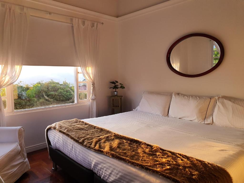 Voodi või voodid majutusasutuse Hotel Casa Madero toas
