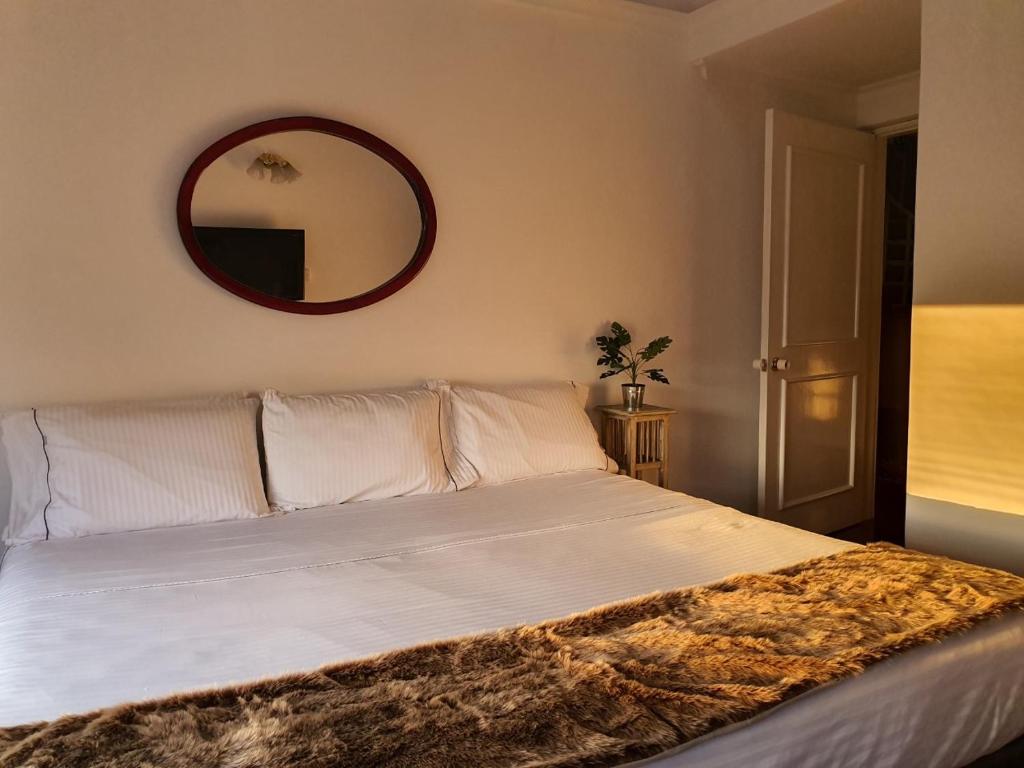 Voodi või voodid majutusasutuse Hotel Casa Madero toas