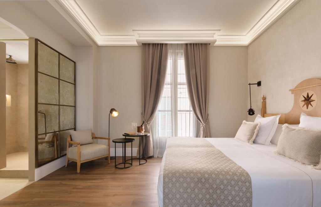 Postel nebo postele na pokoji v ubytování Hotel Antigua Palma - Casa Noble
