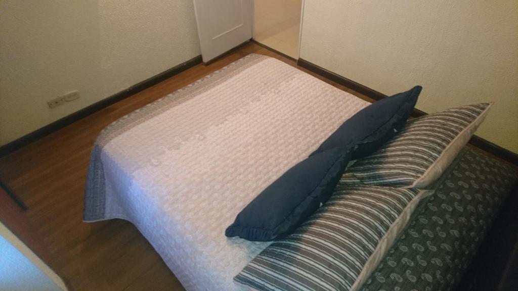 Postel nebo postele na pokoji v ubytování Aloha