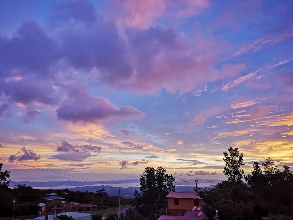 a view of a cloudy sky at sunset at Calathea Lodge Monteverde in Monteverde Costa Rica