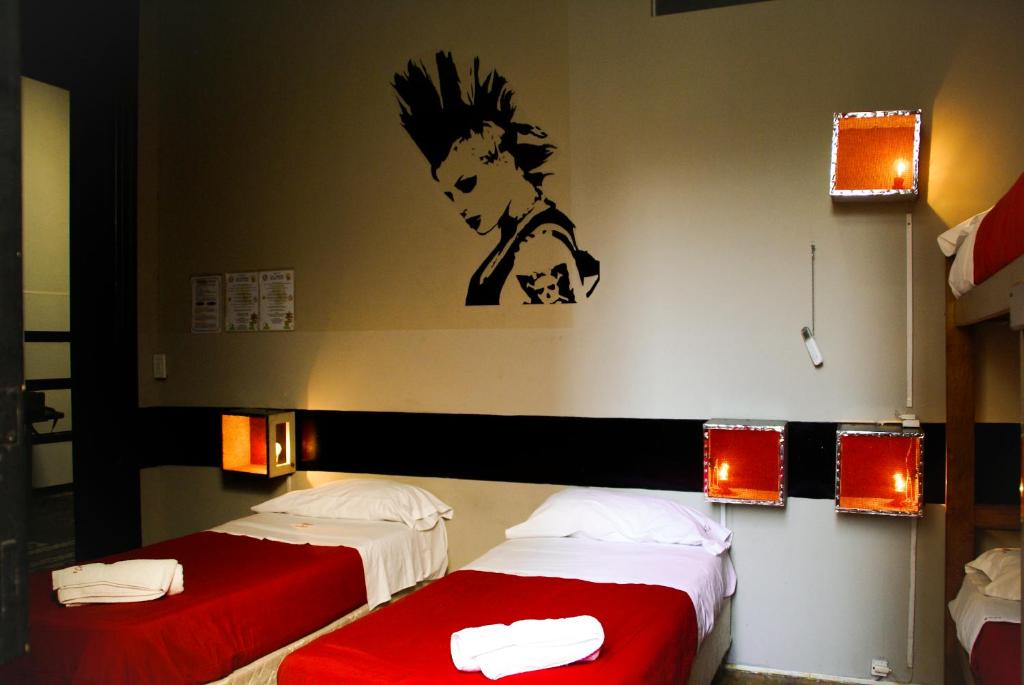 Postel nebo postele na pokoji v ubytování Hostel La Casona de Don Jaime 2 and Suites HI