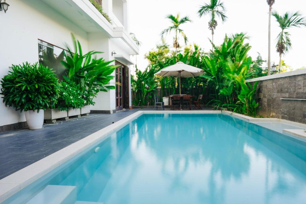 Bazén v ubytování Hoi An Lotus Aroma Villa nebo v jeho okolí