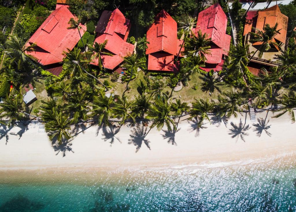 an aerial view of a resort on a beach at The Natives Samui in Ban Bang Po