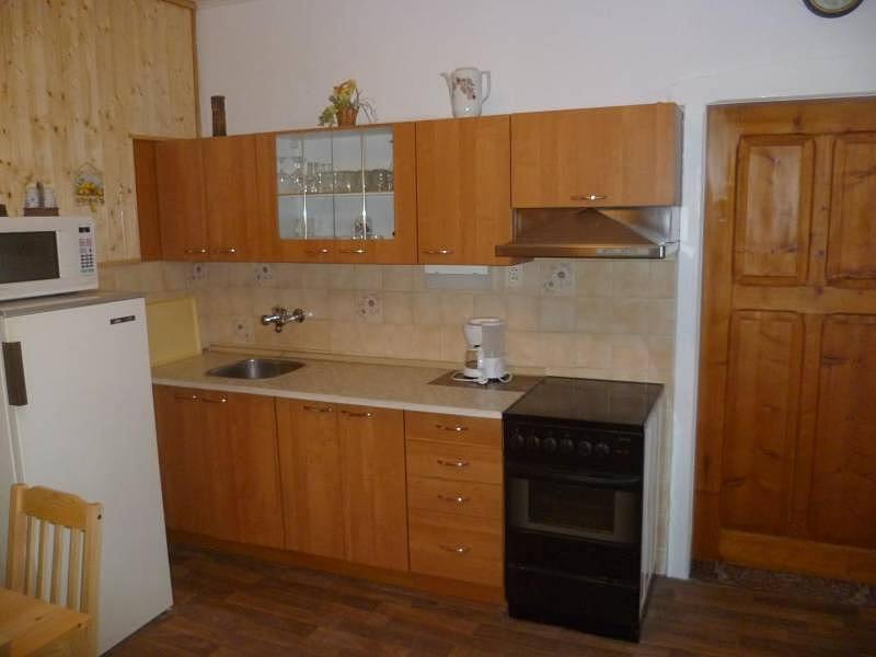 Kuchyň nebo kuchyňský kout v ubytování Apartmány U Kocoura pod Klínovcem