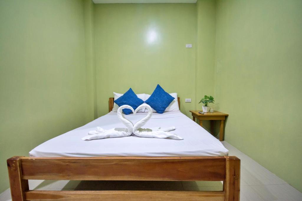 Postel nebo postele na pokoji v ubytování Boracay Backpackers