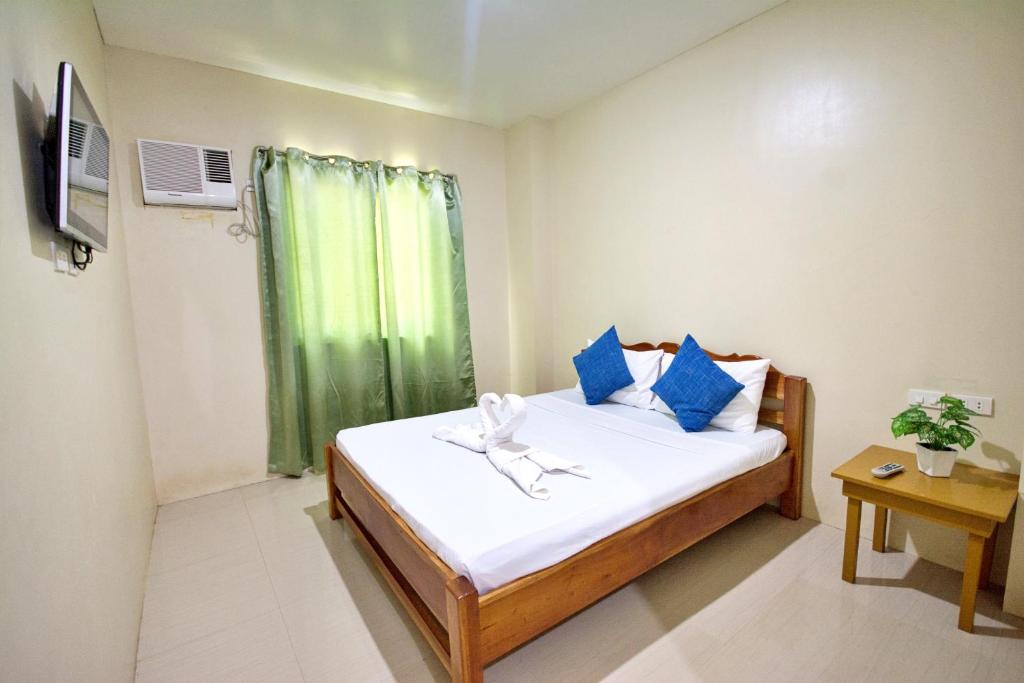 Postel nebo postele na pokoji v ubytování Boracay Backpackers